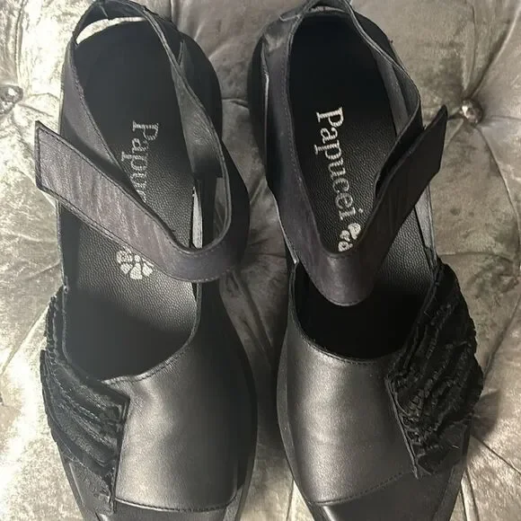 Papucei Helga black leather sandal NWOT, size 41 or 10.5, has some imperfections